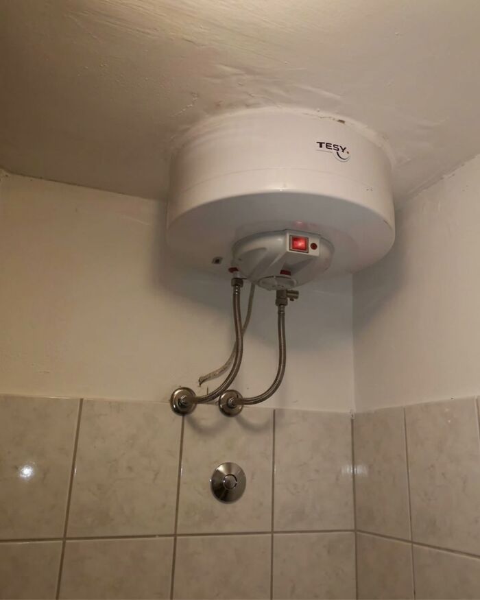A water heater installed upside down, highlighting a unique approach to Slavic Science.