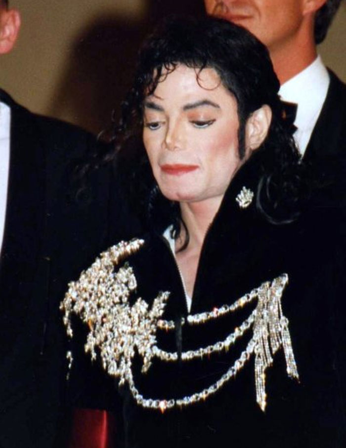 Close-up of a romanticized historical figure wearing ornate jacket