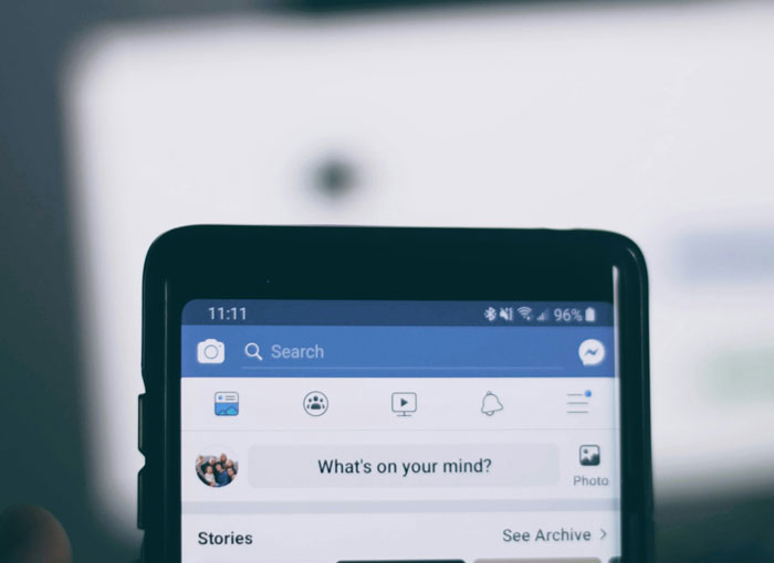Close-up of a smartphone screen showing a social media app. Heartwarming and heartbreaking things on late parents' phones.