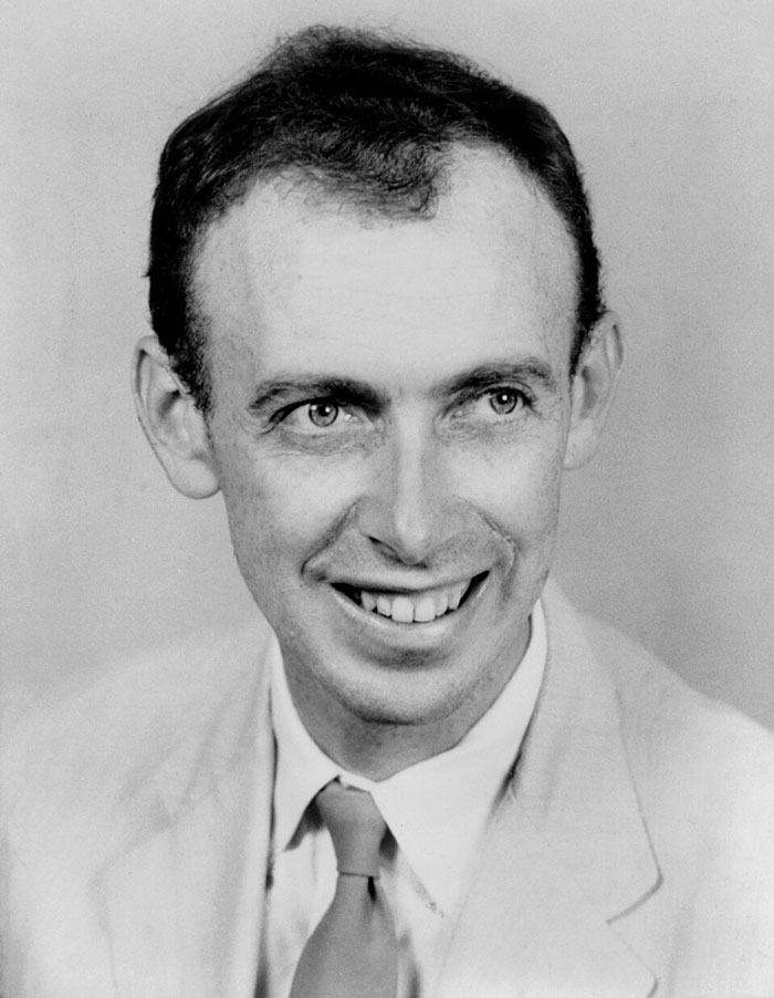 Black and white photo of J. Robert Oppenheimer, a romanticized historical figure