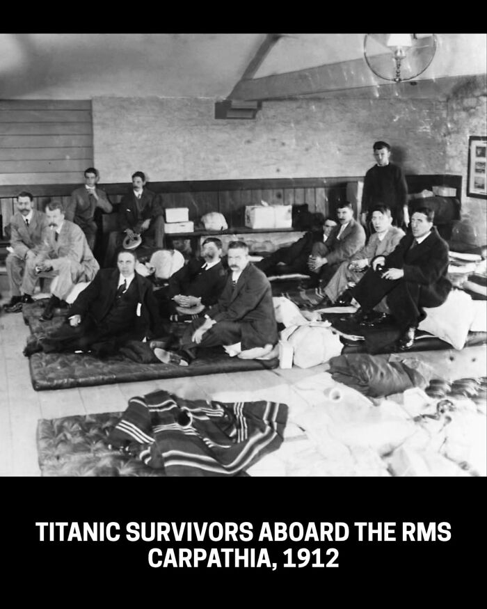 Historical photo of Titanic survivors on mattresses aboard the RMS Carpathia in 1912.