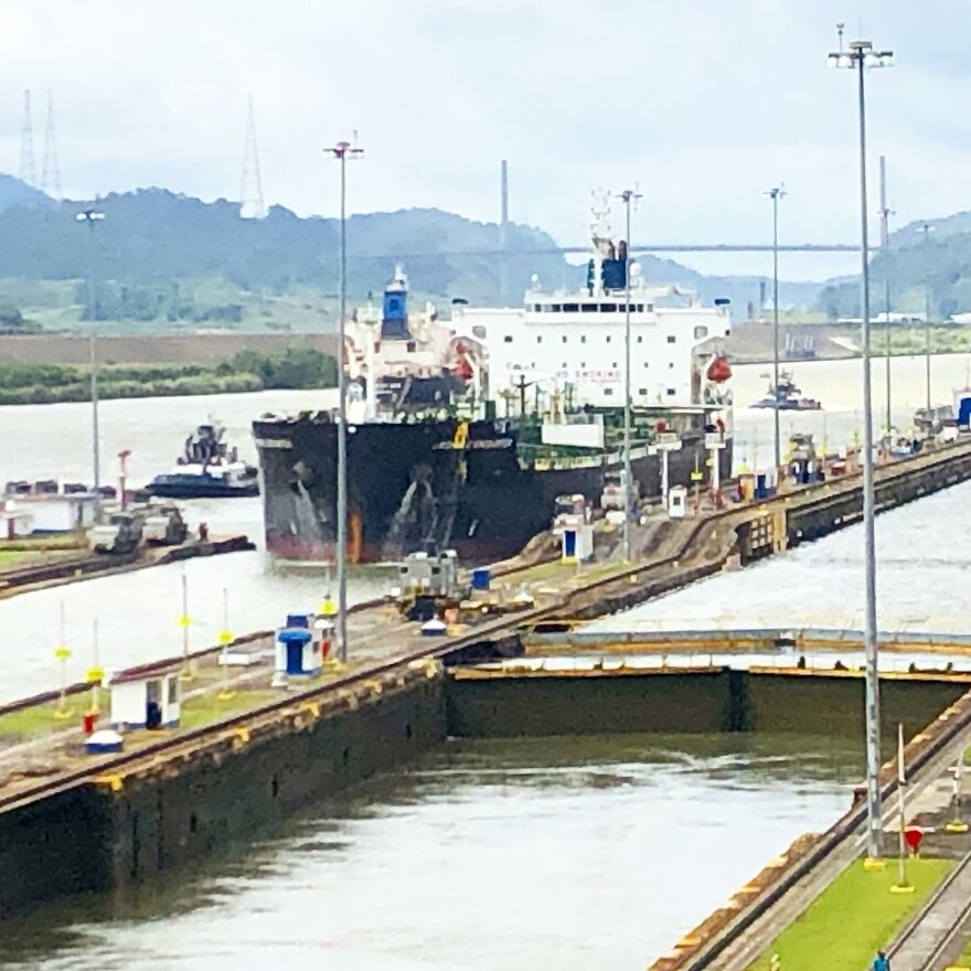 Cargo ship passing through a Panama Canal