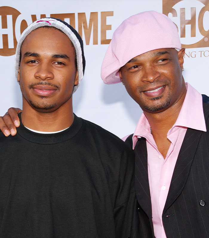 Damon Wayans and son Damon Wayans Jr. on a red carpet, a famous dad-son duo who are clones.
