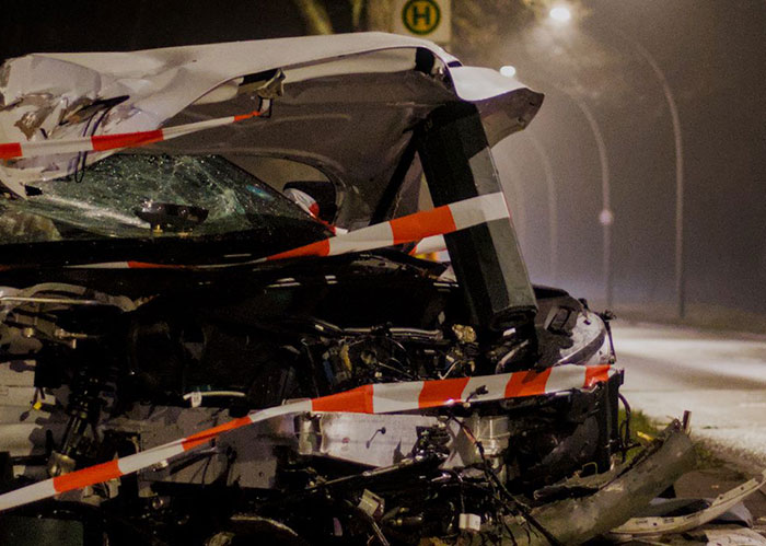 Cops investigate a car accident, a scene related to popular kids who peaked in high school