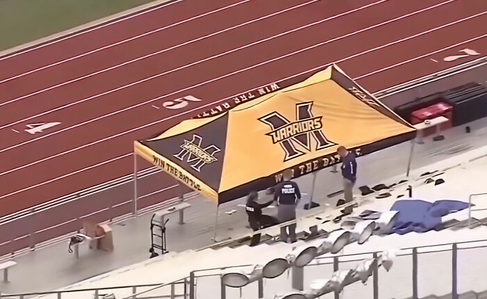 Police investigate under Warriors tent at outdoor sports track