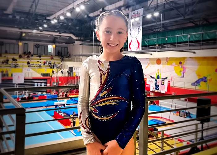 Smiling gymnast at sports venue connected to missing child police case Smiling gymnast at sports venue connected to missing child police case