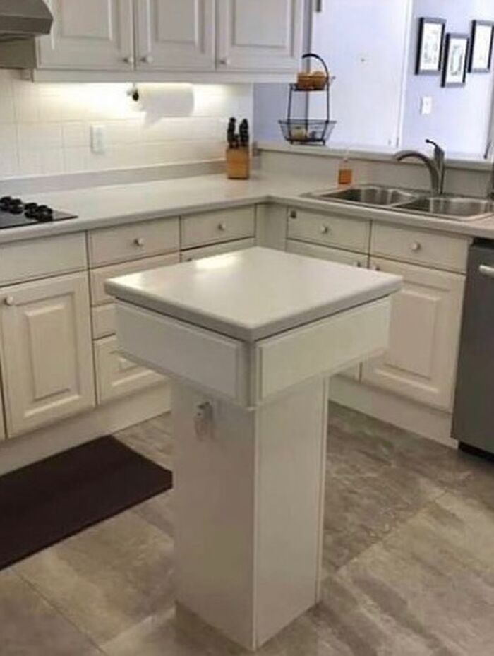 Kitchen island design fail with unstable base and no usable counter space