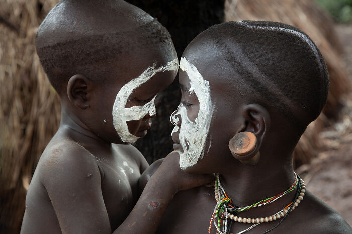 “A Mother's Hold, A Child's World” By Athanasios Maloukos