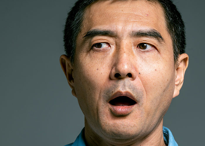 Man shocked expression showing time to leave immediately
