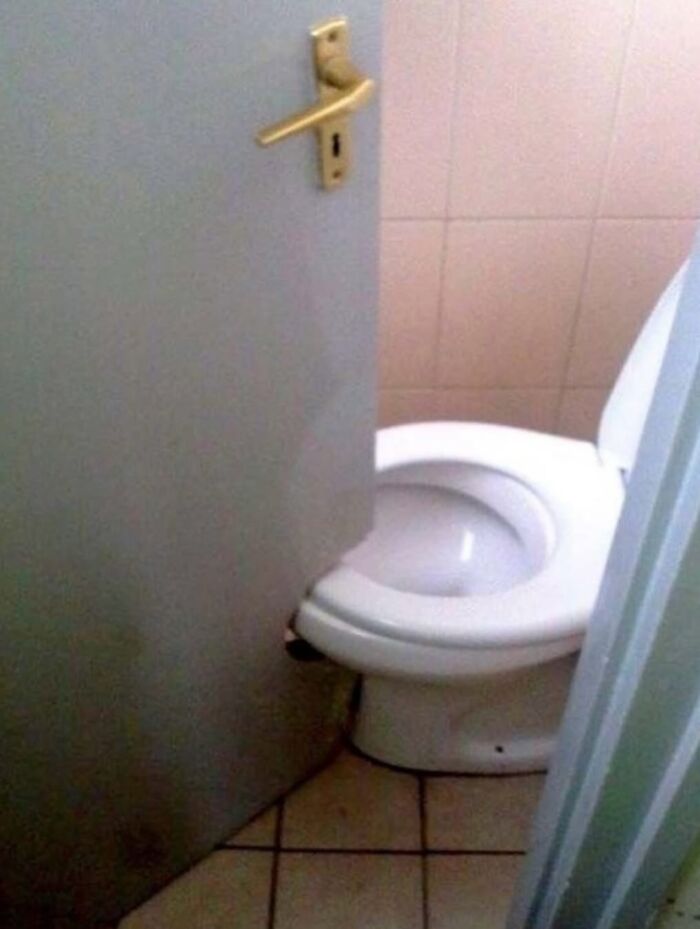 Bathroom door design fail blocking access to toilet