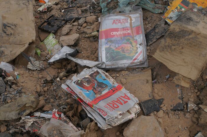 Atari video game cartridges buried in the desert, part of the unsolved mysteries of gaming history.
