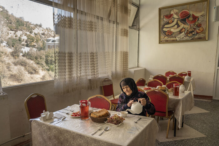 Overall Winner: A Woman Eats In The Canteen Of The Soviet-Era Sanatorium By Jo Kearney, United Kingdom