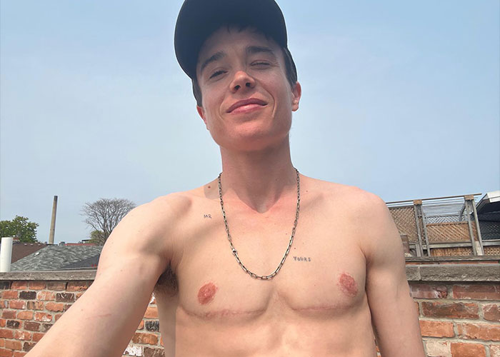 Elliot Page shows off shredded physique outdoors, highlighting his boxing dedication. He looks happy and healthy.