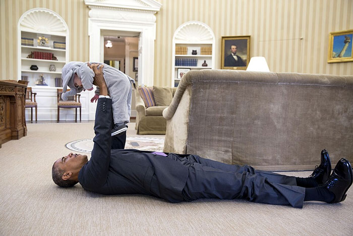 World leader playing with baby in Oval Office