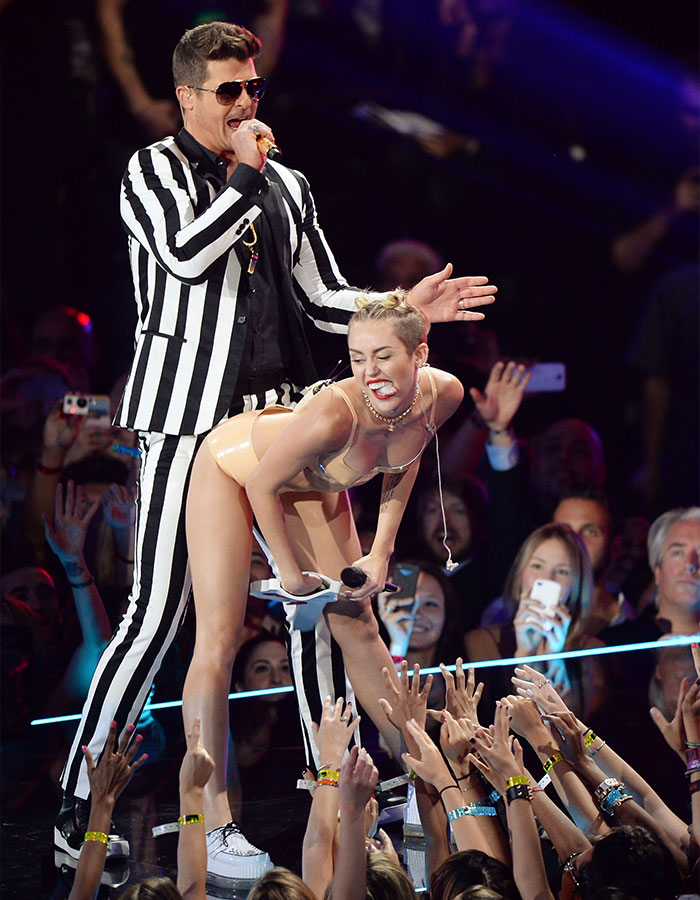 Miley Cyrus performing at concert with Robin Thicke Miley Cyrus performing at concert with Robin Thicke