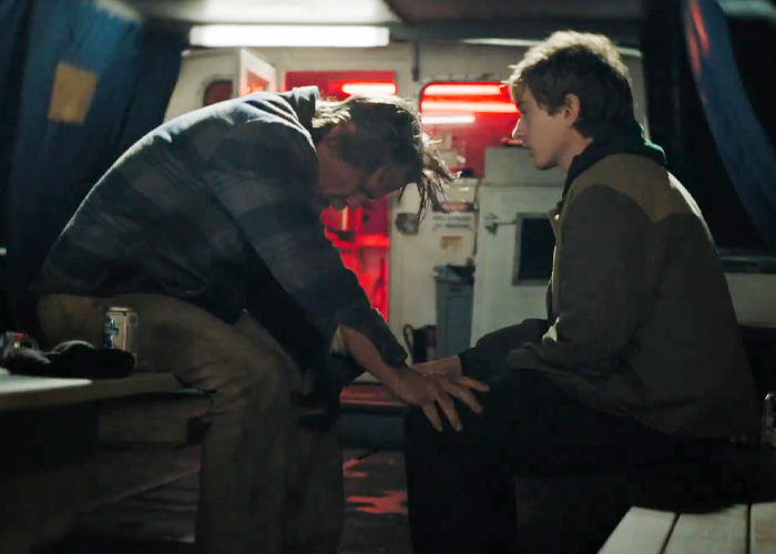 Two men talking inside boat cabin in Josh Brolin film Two men talking inside boat cabin in Josh Brolin film