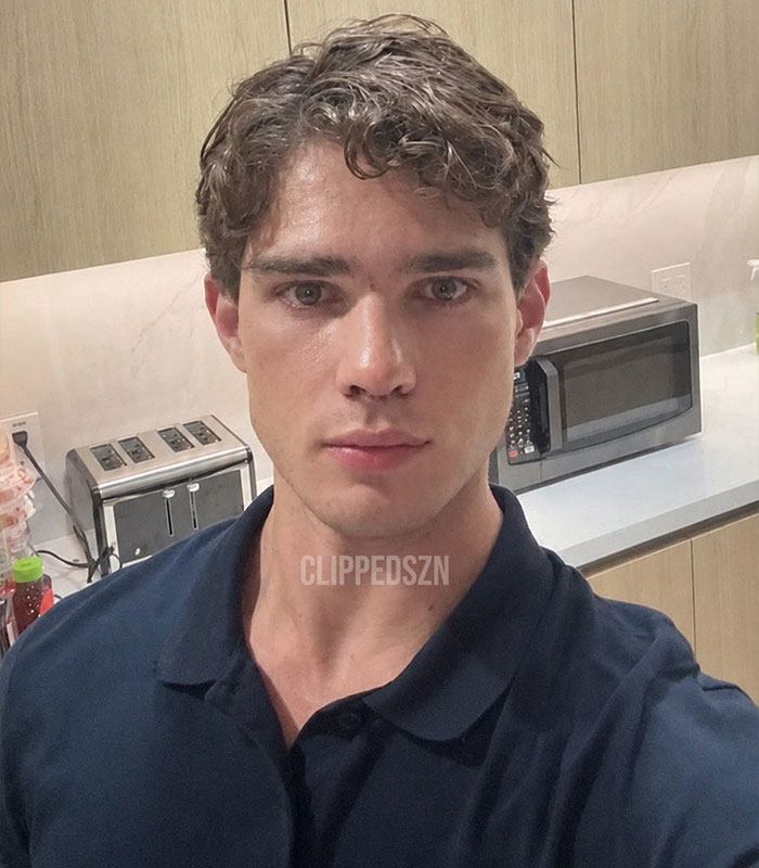 Close-up selfie of man with styled hair post looksmaxxing Close-up selfie of man with styled hair post looksmaxxing