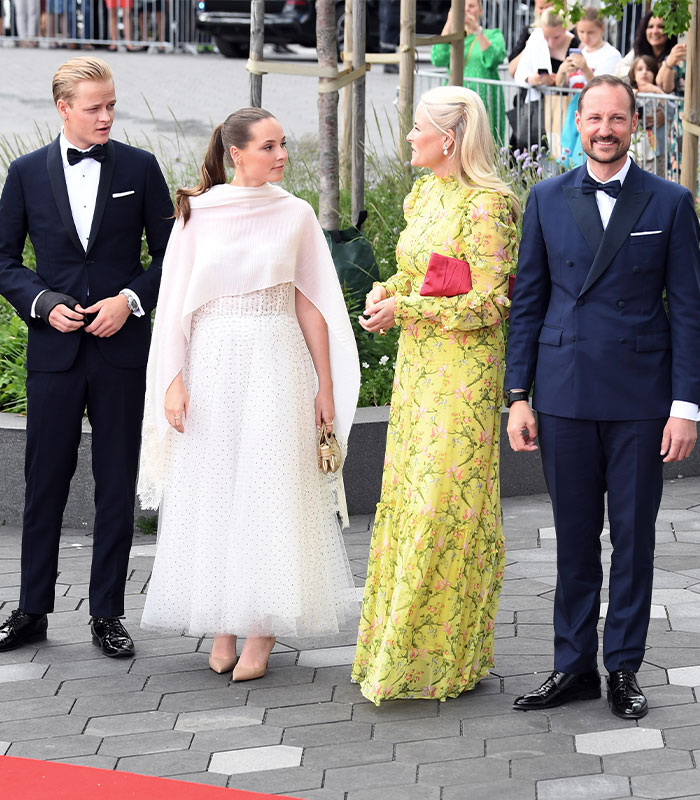 Norwegian royal family at public event in formal attire