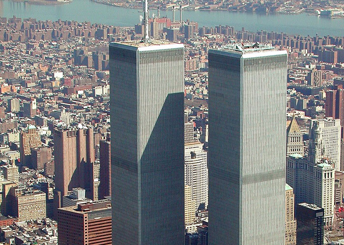 An aerial view of the Twin Towers in New York City, representing a time and era when many popular kids peaked in high school.