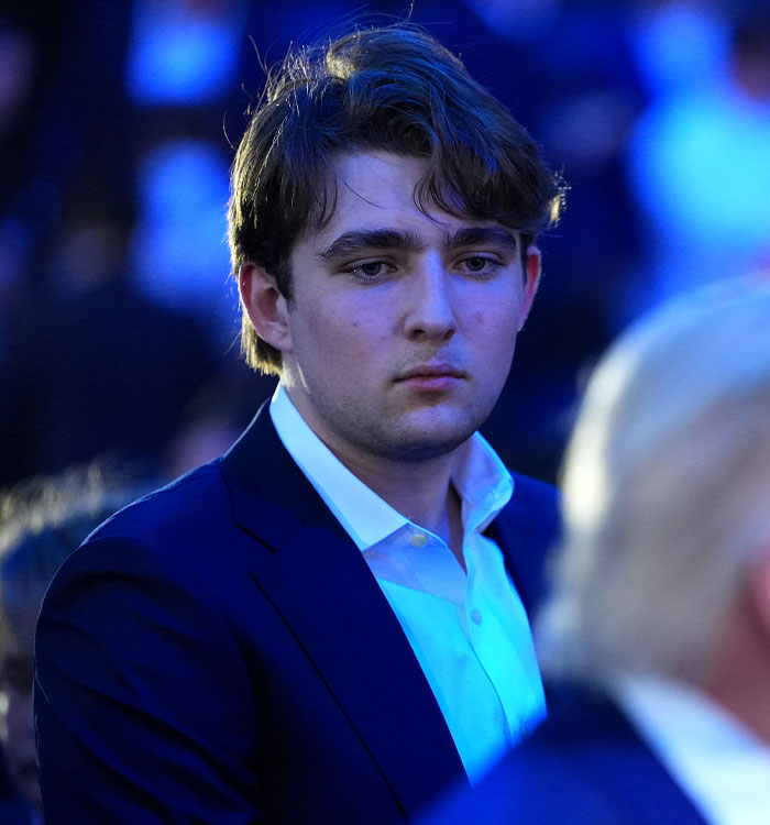 Close-up of Barron Trump looking serious at UFC event Close-up of Barron Trump looking serious at UFC event