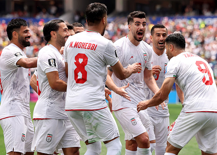 The Iran World Cup team celebrates a goal, sparking a viral frenzy.