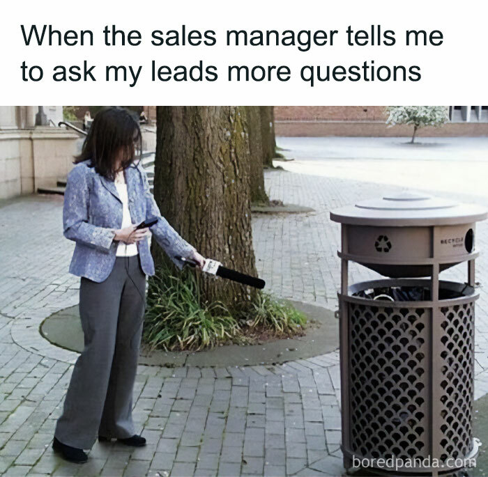 Salesperson ignoring leads advice from sales manager by pretending to use mic on trash