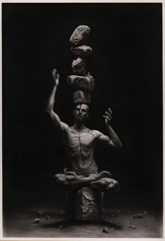 Surreal pencil drawing of a seated man with stacked rocks balancing above his head