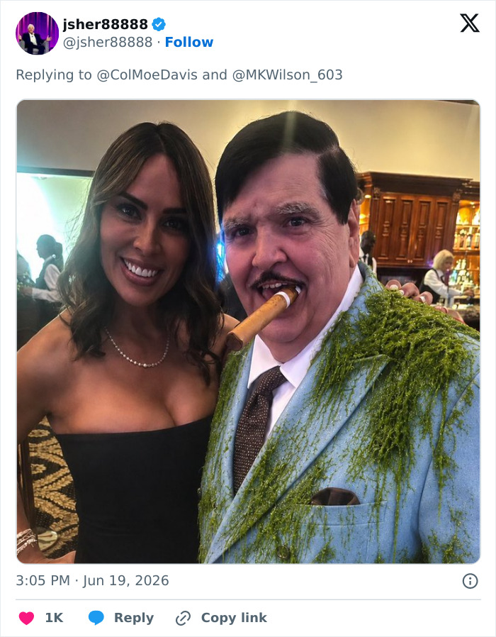 The guy Trump hired to renovate the Reflecting Pool in a suit covered in moss, with a woman.