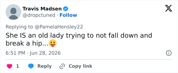 Twitter post by Travis Madsen, suggesting Madonna is trying not to fall down and break a hip during her performance.