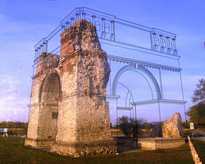 Ruins of ancient arch with overlay drawing showing its original complete structure