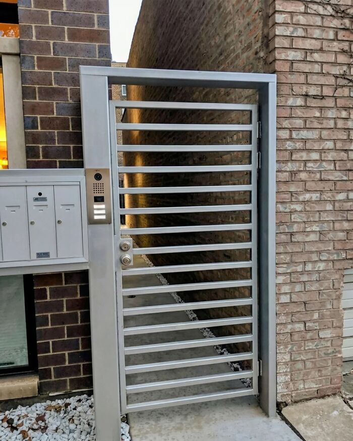 Metal gate blocking access with no space to enter behind it