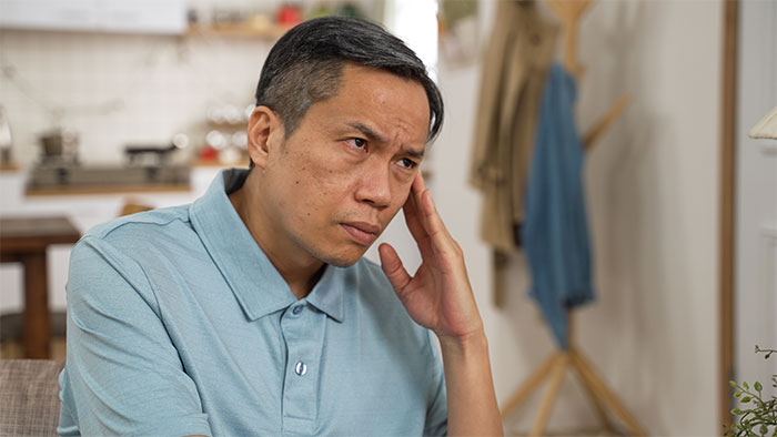 A woman is told to leave home after refusing to follow one rule. A man looks stressed and confused indoors.