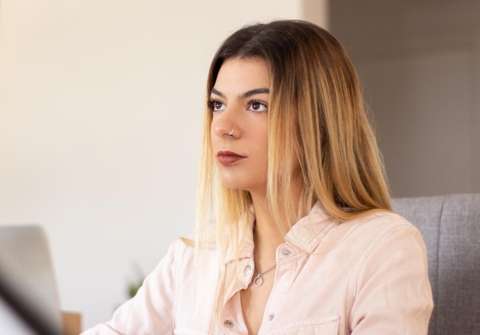 A thoughtful fiancée looking into the distance, pondering the problem in their relationship with their perpetually hungry partner. A thoughtful fiancée looking into the distance, pondering the problem in their relationship with their perpetually hungry partner.
