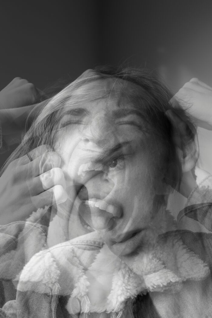 A black and white abstract image of a distressed face, representing a crazy plane interaction.