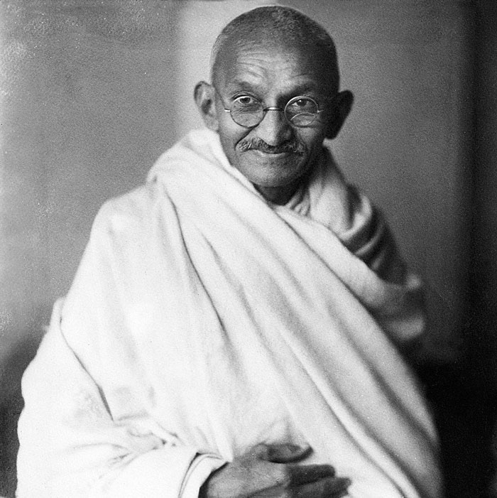 Portrait of a man in glasses wrapped in white cloth highlighting romanticized historical figures