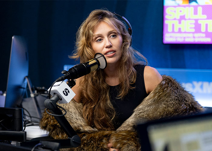 Miley Cyrus speaking on radio show during interview Miley Cyrus speaking on radio show during interview