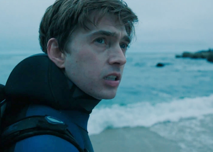 Close up of a man in a wetsuit looking toward the ocean in Josh Brolin's film scene Close up of a man in a wetsuit looking toward the ocean in Josh Brolin's film scene