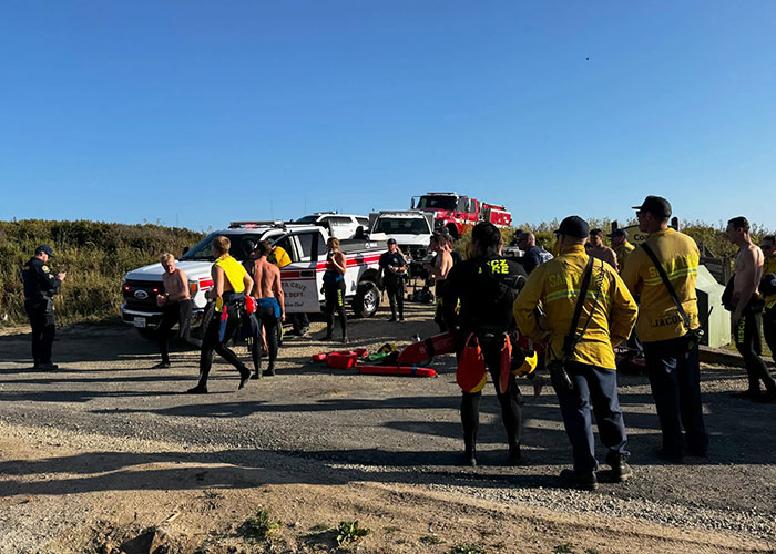 Firefighters and rescue team gathered at California beach emergency site Firefighters and rescue team gathered at California beach emergency site