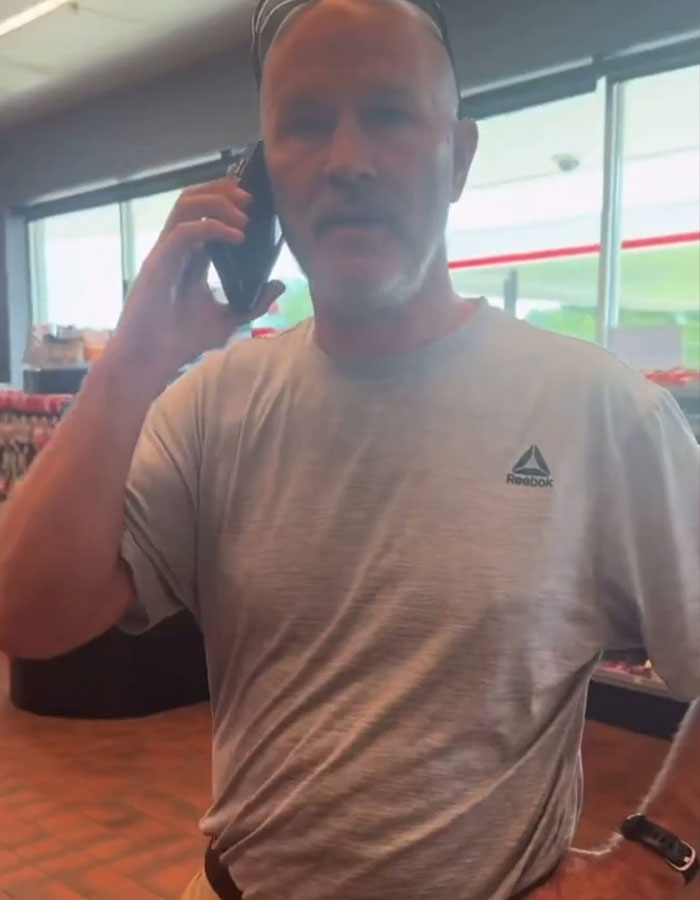 Man on phone involved in male Karen restroom harassment incident Man on phone involved in male Karen restroom harassment incident