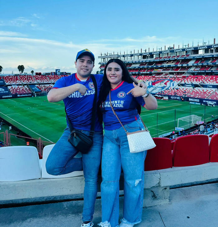 A happy couple at a stadium, part of the viral Good-Vibe Girls controversy surrounding the mayor's Father's Day party.