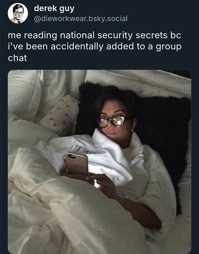 A meme of Kris Jenner in bed, wearing glasses and a robe, looking at her phone, depicting reading secrets in a group chat.