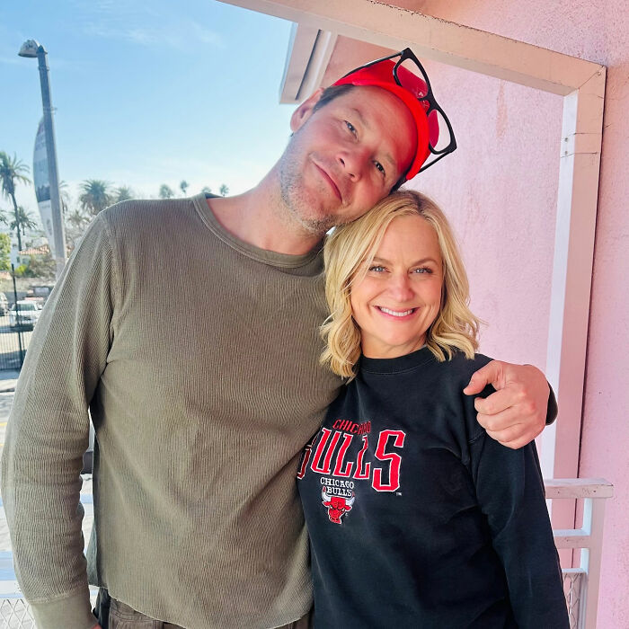 Will Arnett and Amy Poehler pose together, smiling at the camera, after his divorce from ex Amy Poehler. Will Arnett and Amy Poehler pose together, smiling at the camera, after his divorce from ex Amy Poehler.