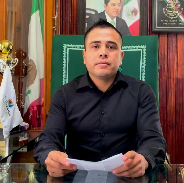 Mayor Rafael Olvera, organizer of the viral Father's Day party, at his desk.