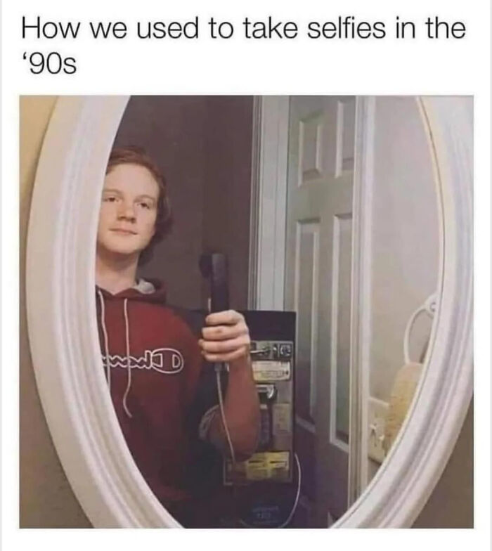 A blursed meme of a person taking a mirror selfie with a corded phone in the 90s.