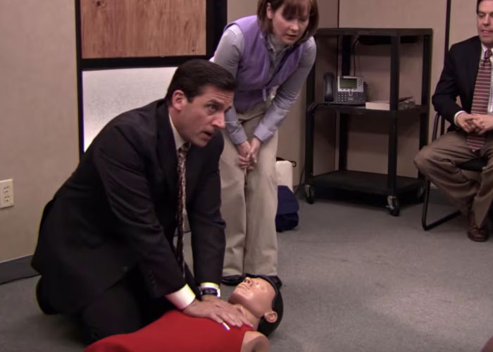Man performing CPR on training dummy illustrating wild secrets taken to graves