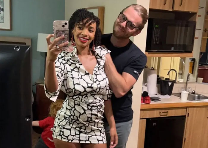 California housewife takes selfie with man in cozy home setting California housewife takes selfie with man in cozy home setting