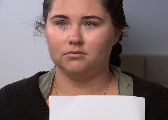 Serious woman holding paper during interview about 4-year-old girl's disappearance Serious woman holding paper during interview about 4-year-old girl's disappearance