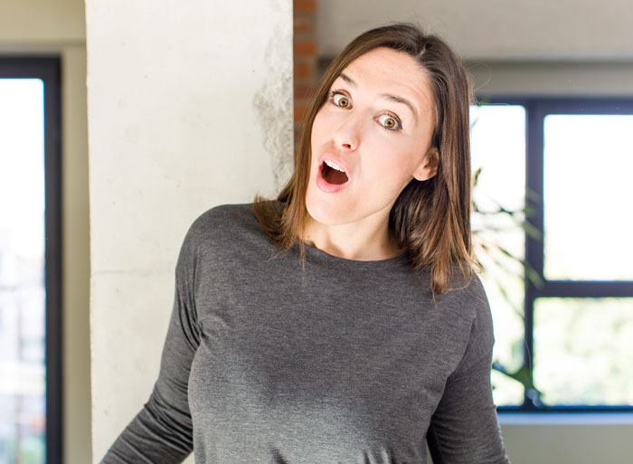 Surprised woman reacting in typical Karen style manner
