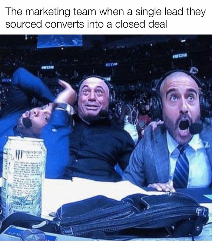 Excited marketing team reacting wildly after a single lead converts into a closed sales deal