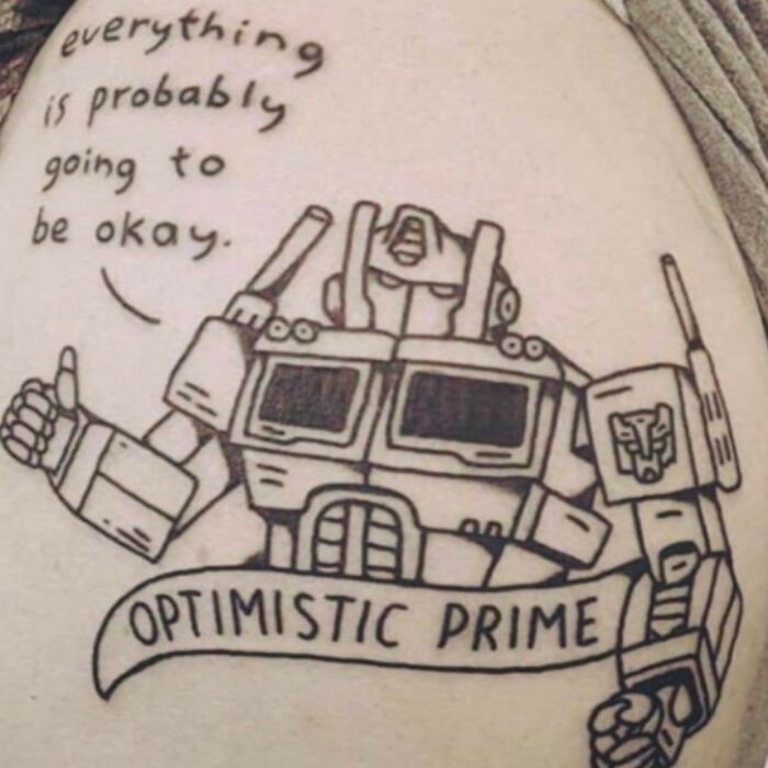 Hilarious Optimistic Prime tattoo meme for those who see their body as a canvas.